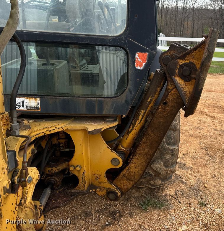 image for item DV1899 1997 John Deere 310E backhoe