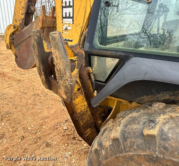 image for item DV1899 1997 John Deere 310E backhoe