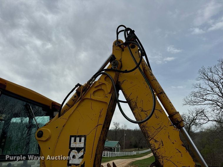 image for item DV1899 1997 John Deere 310E backhoe