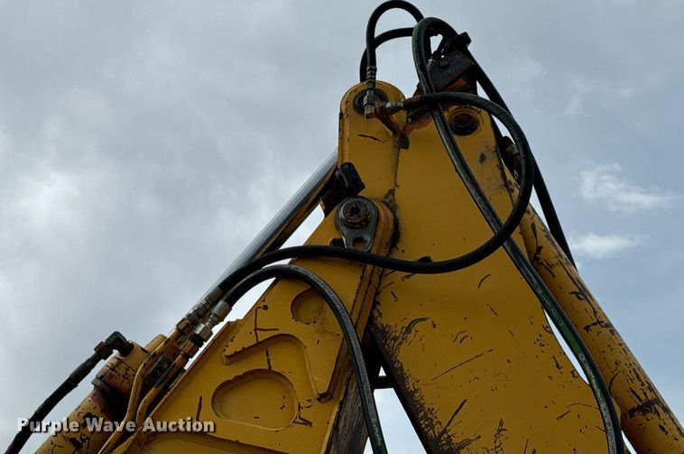 image for item DV1899 1997 John Deere 310E backhoe