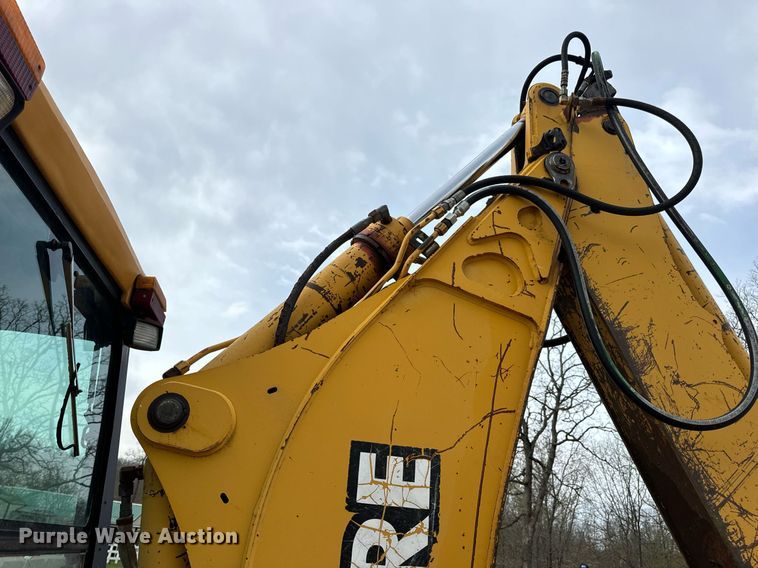 image for item DV1899 1997 John Deere 310E backhoe