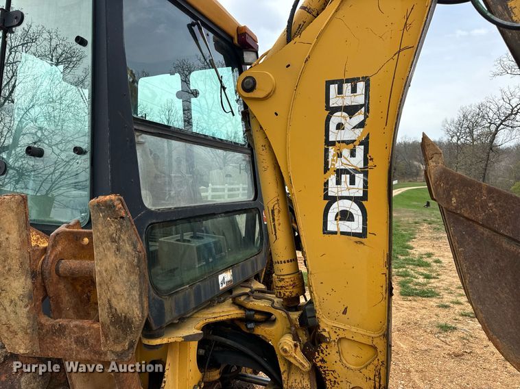 image for item DV1899 1997 John Deere 310E backhoe