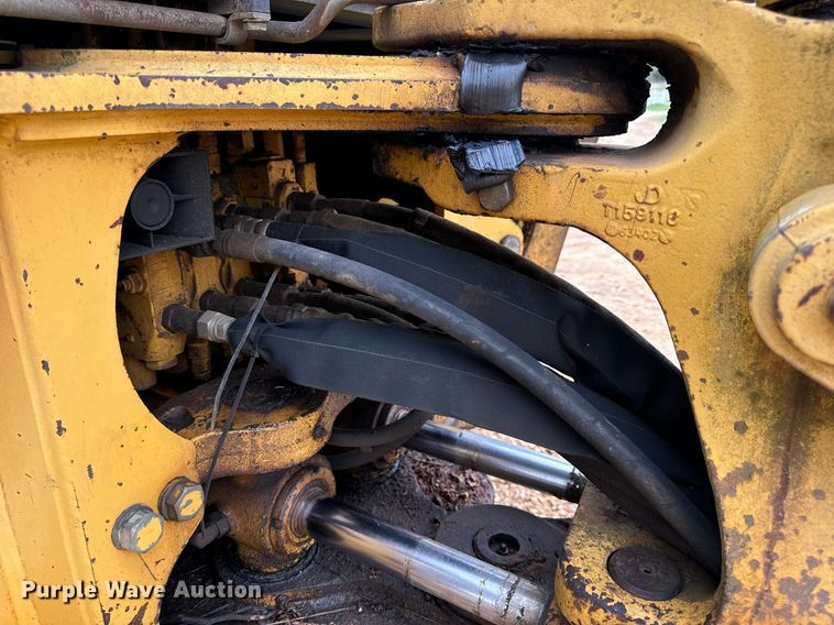 image for item DV1899 1997 John Deere 310E backhoe