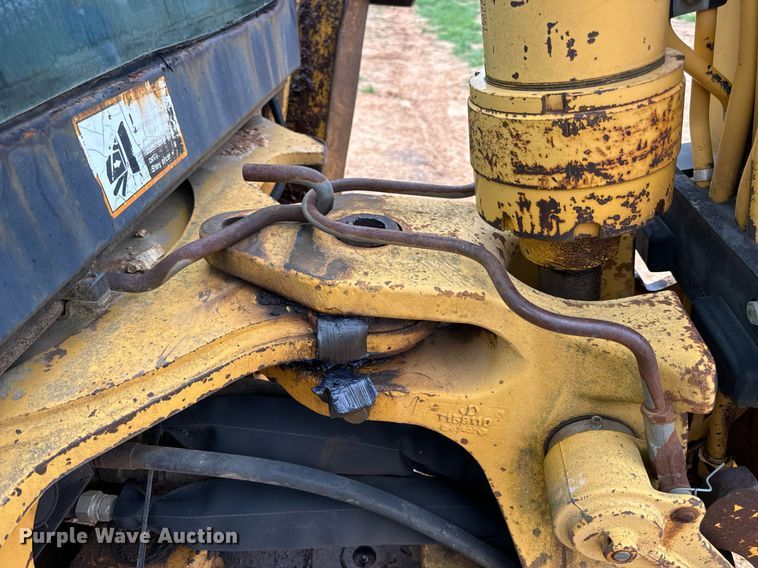 image for item DV1899 1997 John Deere 310E backhoe