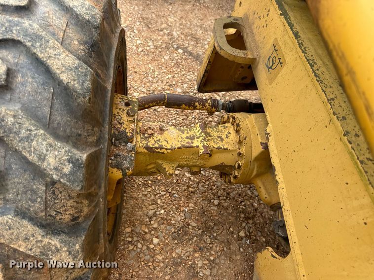 image for item DV1899 1997 John Deere 310E backhoe