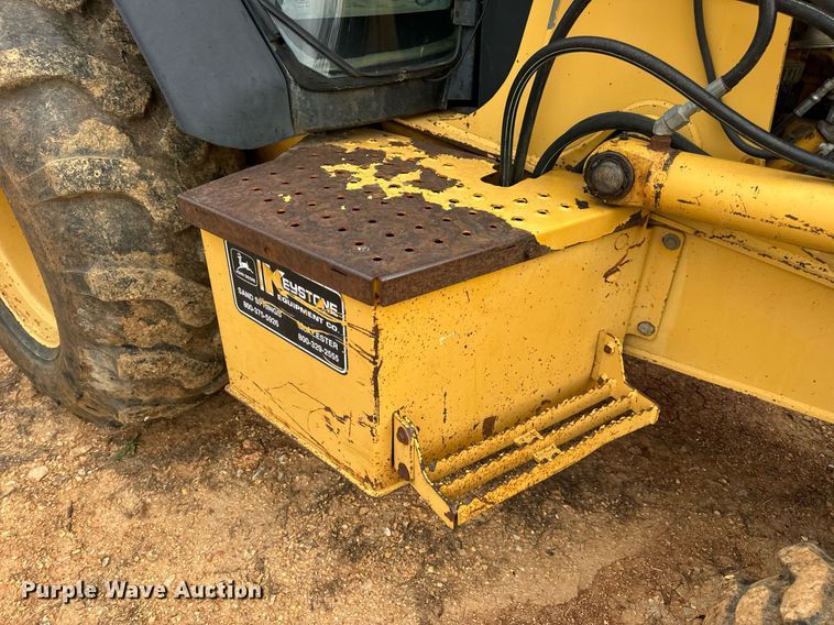 image for item DV1899 1997 John Deere 310E backhoe