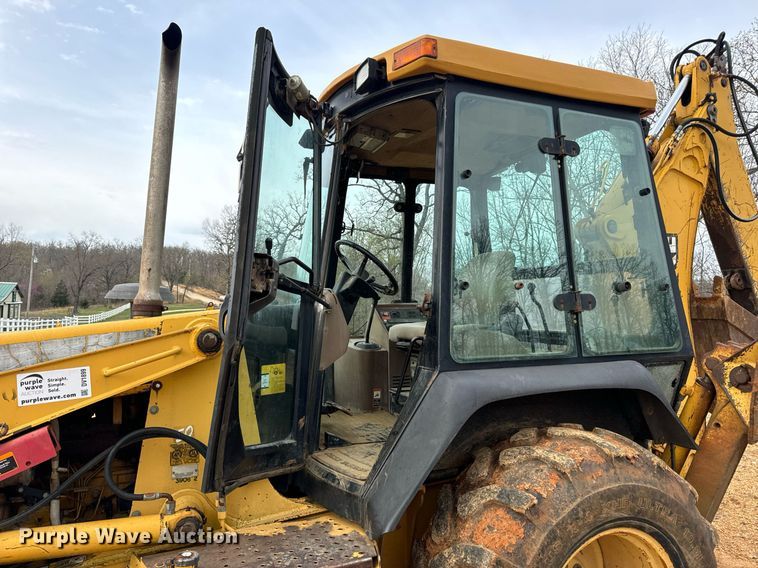 image for item DV1899 1997 John Deere 310E backhoe