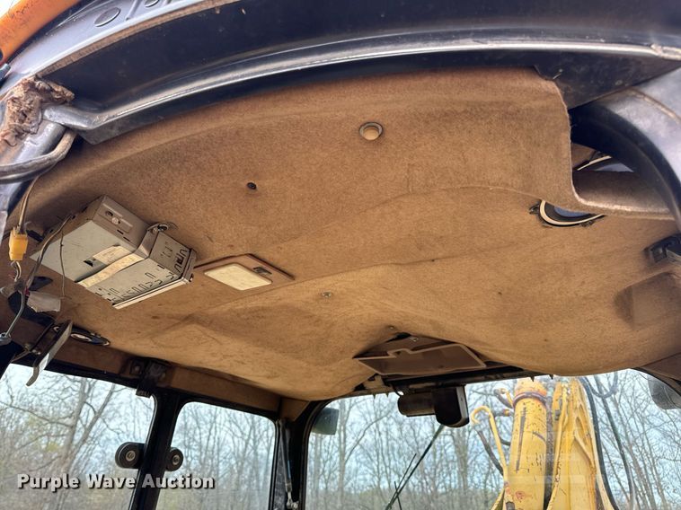 image for item DV1899 1997 John Deere 310E backhoe