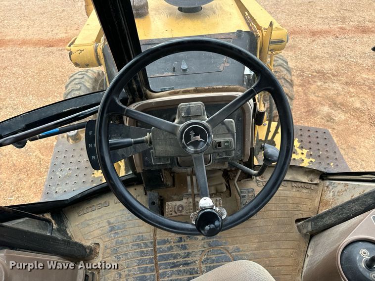 image for item DV1899 1997 John Deere 310E backhoe