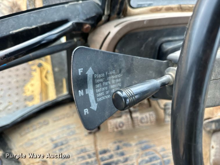 image for item DV1899 1997 John Deere 310E backhoe