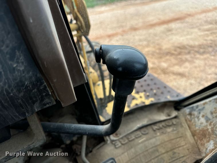 image for item DV1899 1997 John Deere 310E backhoe