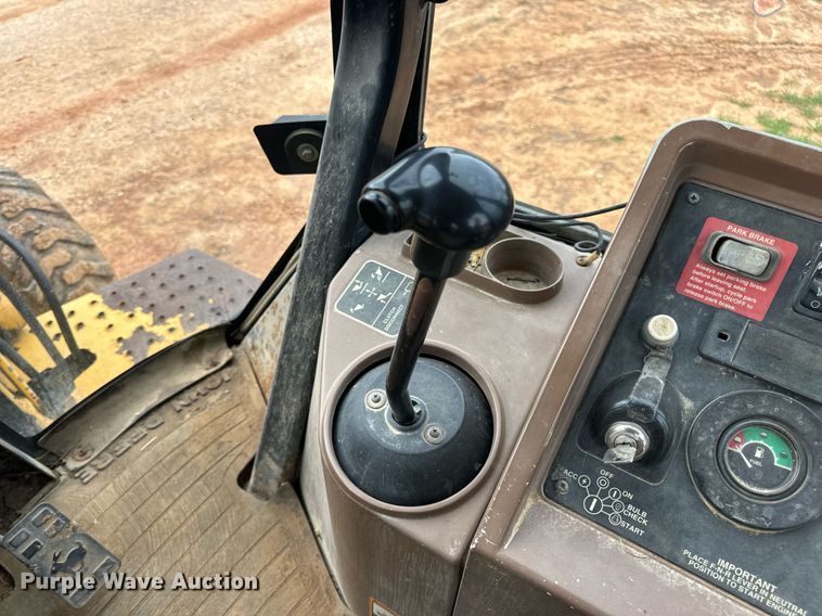 image for item DV1899 1997 John Deere 310E backhoe