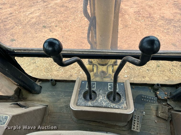 image for item DV1899 1997 John Deere 310E backhoe