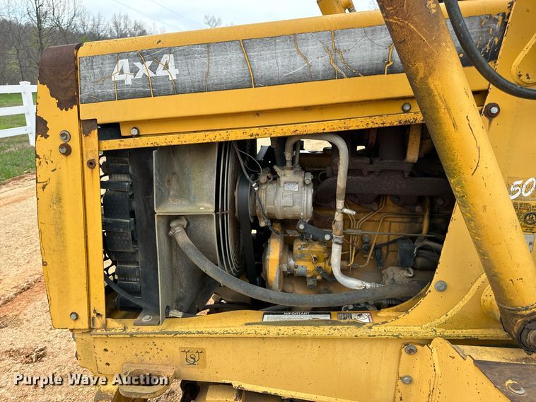image for item DV1899 1997 John Deere 310E backhoe
