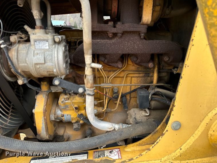 image for item DV1899 1997 John Deere 310E backhoe