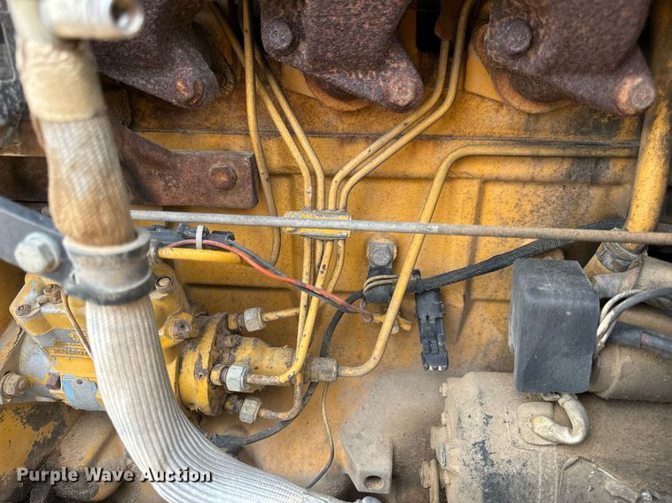 image for item DV1899 1997 John Deere 310E backhoe