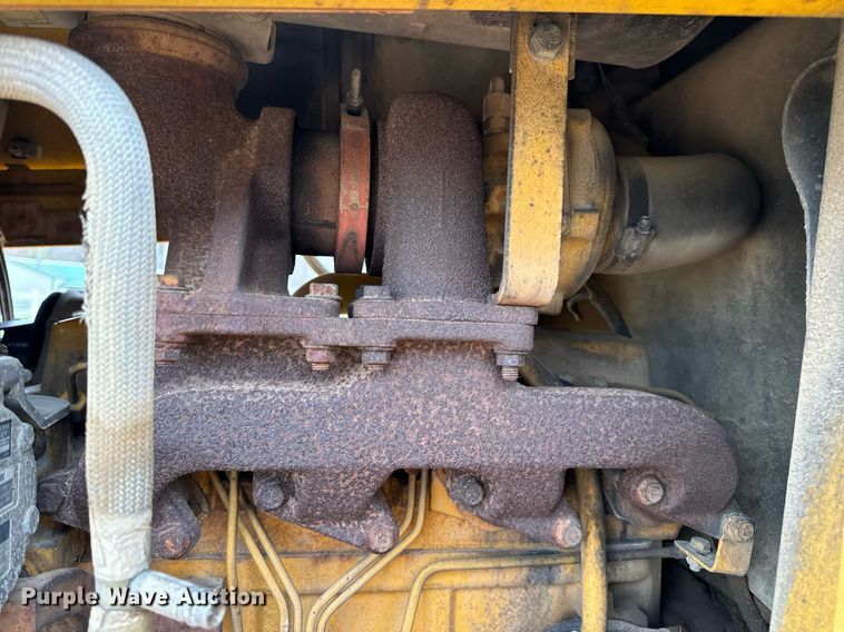 image for item DV1899 1997 John Deere 310E backhoe