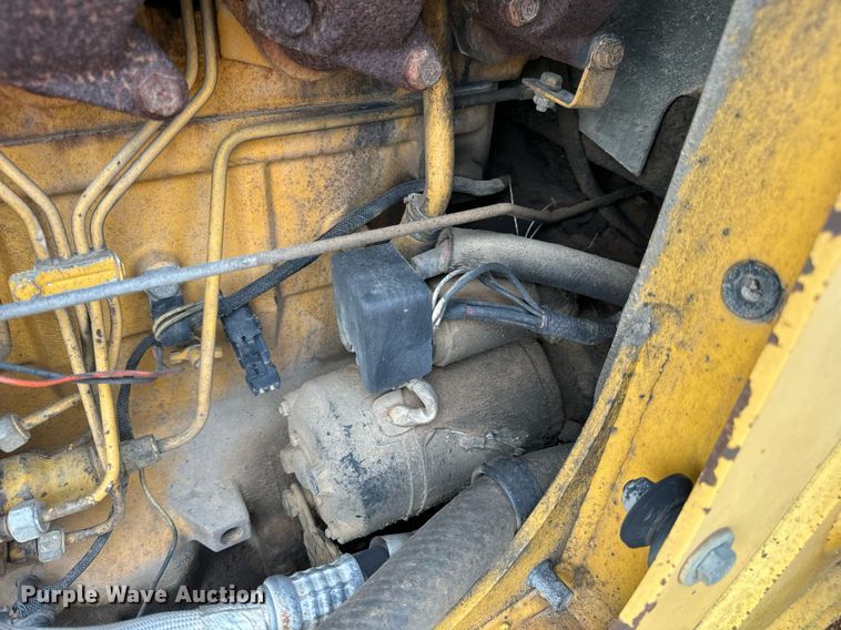 image for item DV1899 1997 John Deere 310E backhoe