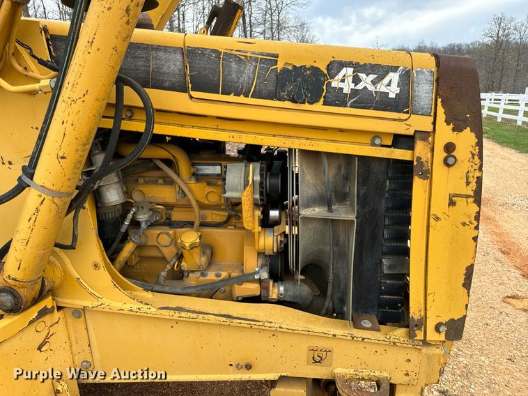 image for item DV1899 1997 John Deere 310E backhoe