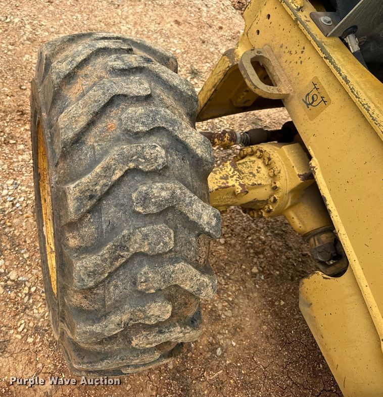 image for item DV1899 1997 John Deere 310E backhoe