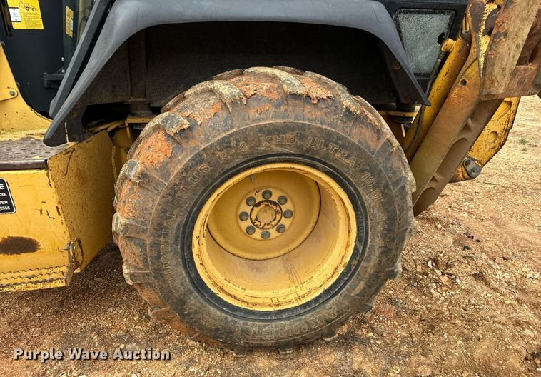 image for item DV1899 1997 John Deere 310E backhoe