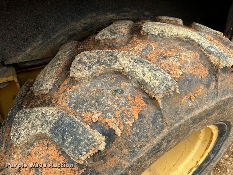 image for item DV1899 1997 John Deere 310E backhoe