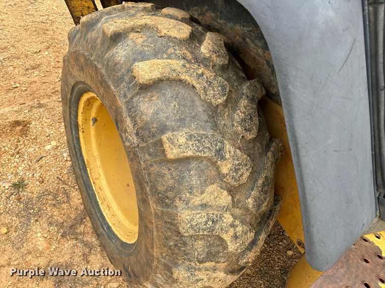 image for item DV1899 1997 John Deere 310E backhoe