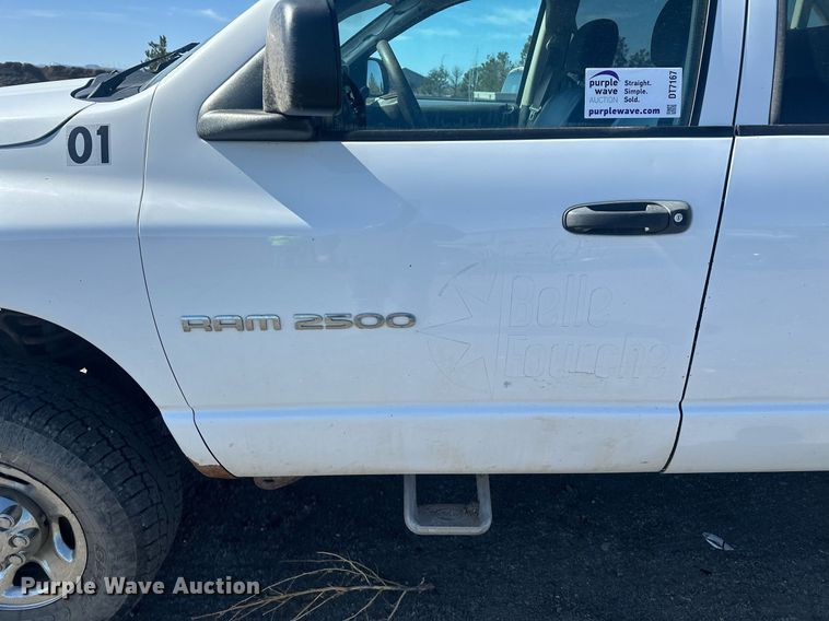 image for item DT7167 2004 Dodge Ram 2500 Quad Cab utility bed pickup truck