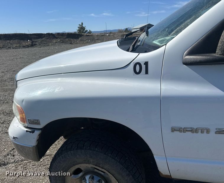 image for item DT7167 2004 Dodge Ram 2500 Quad Cab utility bed pickup truck