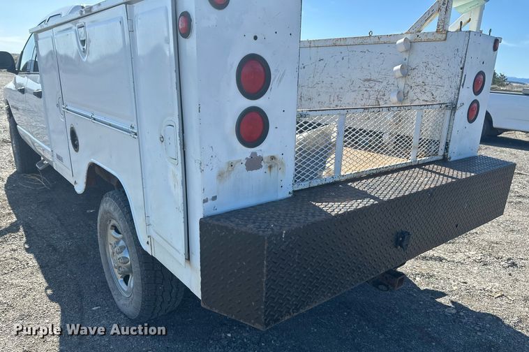 image for item DT7167 2004 Dodge Ram 2500 Quad Cab utility bed pickup truck