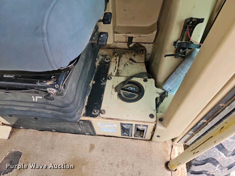 image for item EI8963 1999 Caterpillar 140H motor grader