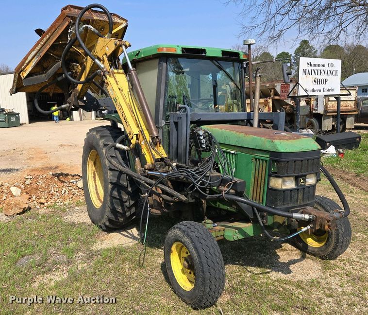 image for item EJ7441 2001 John Deere 6310 tractor