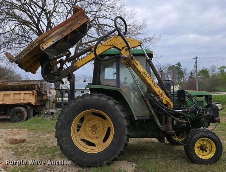image for item EJ7441 2001 John Deere 6310 tractor