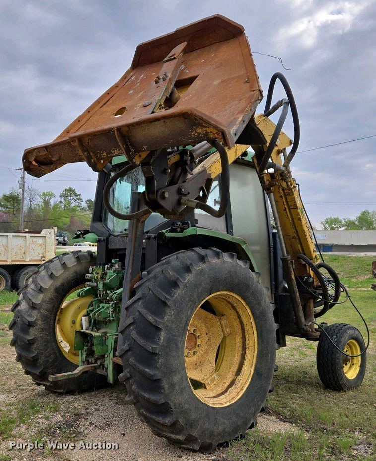 image for item EJ7441 2001 John Deere 6310 tractor