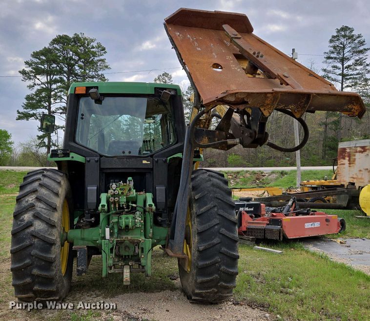 image for item EJ7441 2001 John Deere 6310 tractor