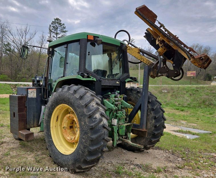 image for item EJ7441 2001 John Deere 6310 tractor