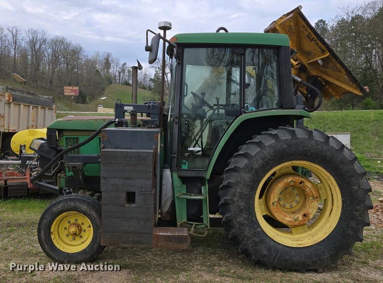 image for item EJ7441 2001 John Deere 6310 tractor