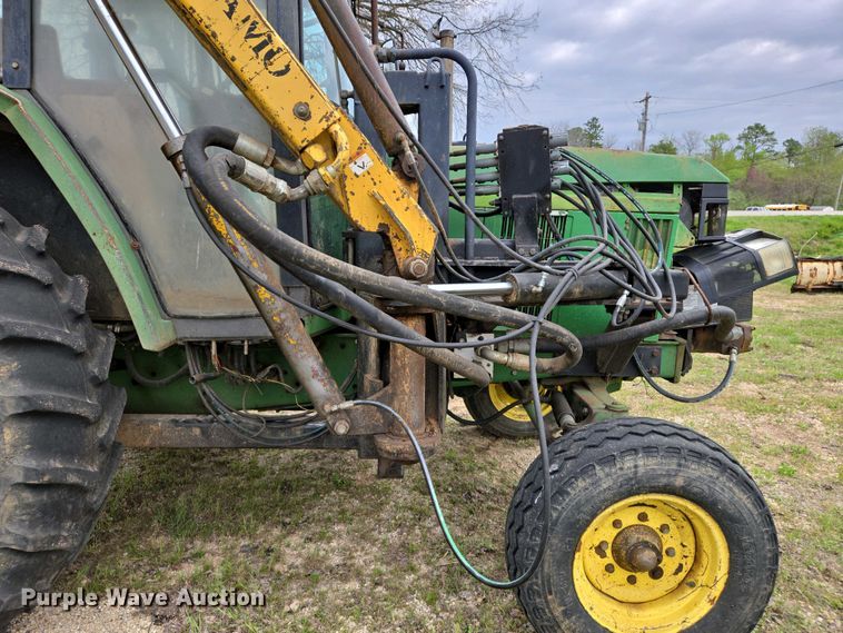 image for item EJ7441 2001 John Deere 6310 tractor