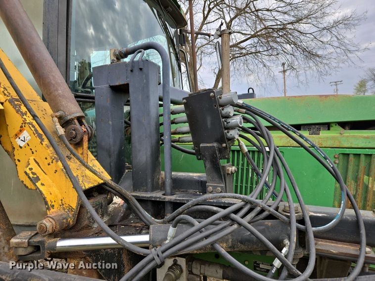 image for item EJ7441 2001 John Deere 6310 tractor