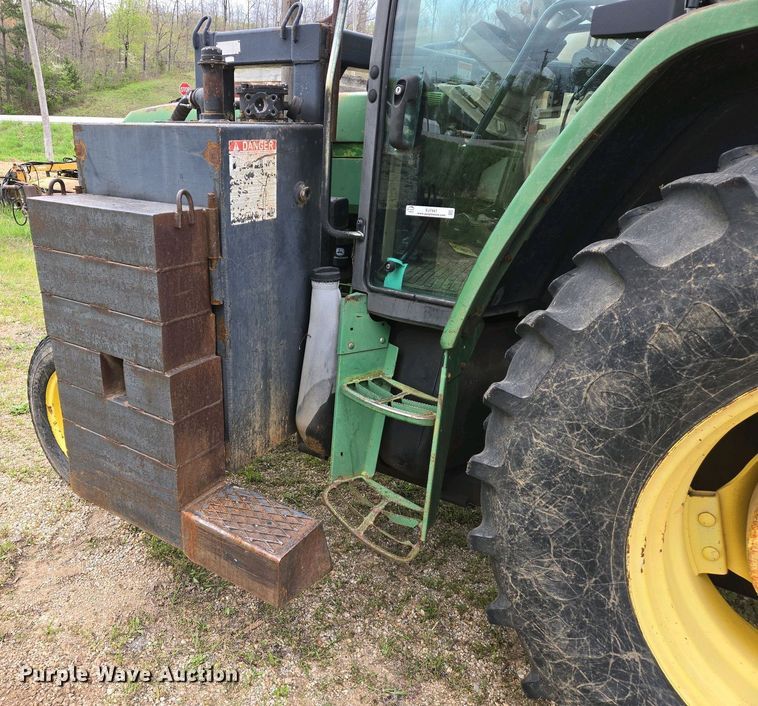 image for item EJ7441 2001 John Deere 6310 tractor