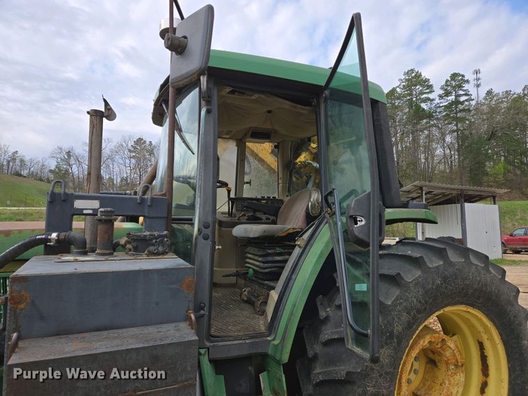 image for item EJ7441 2001 John Deere 6310 tractor