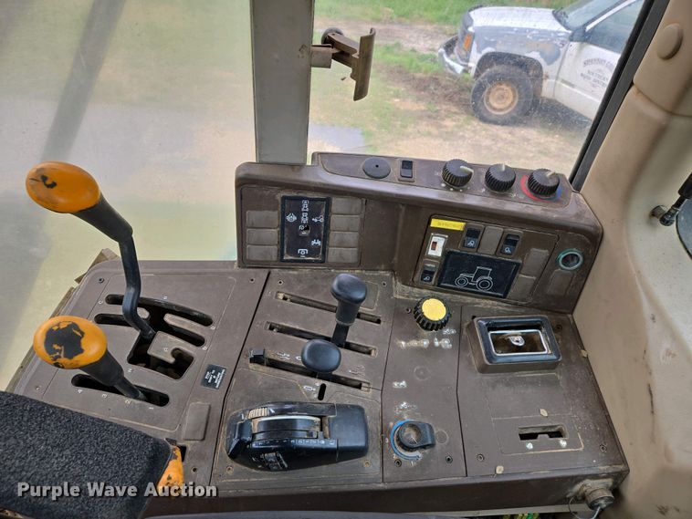 image for item EJ7441 2001 John Deere 6310 tractor