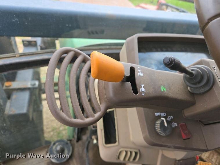 image for item EJ7441 2001 John Deere 6310 tractor