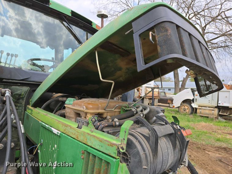 image for item EJ7441 2001 John Deere 6310 tractor