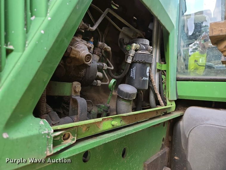 image for item EJ7441 2001 John Deere 6310 tractor