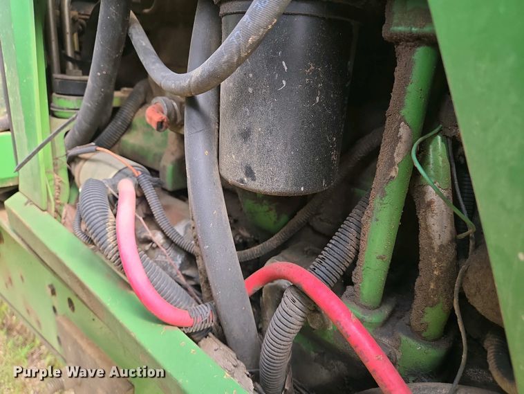 image for item EJ7441 2001 John Deere 6310 tractor