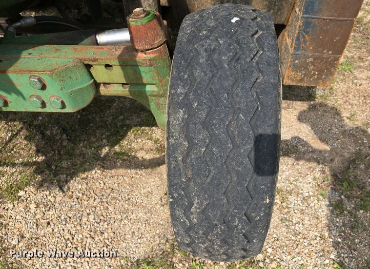 image for item EJ7441 2001 John Deere 6310 tractor