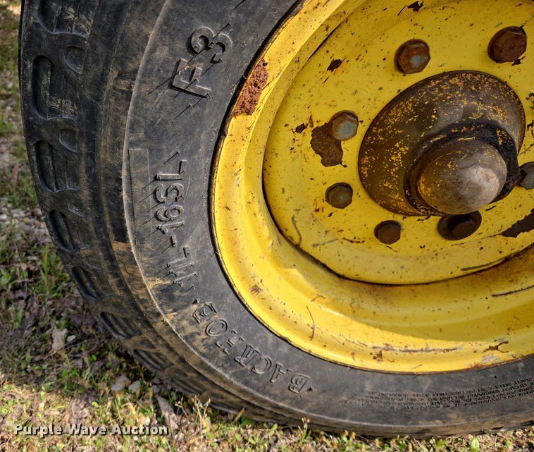 image for item EJ7441 2001 John Deere 6310 tractor