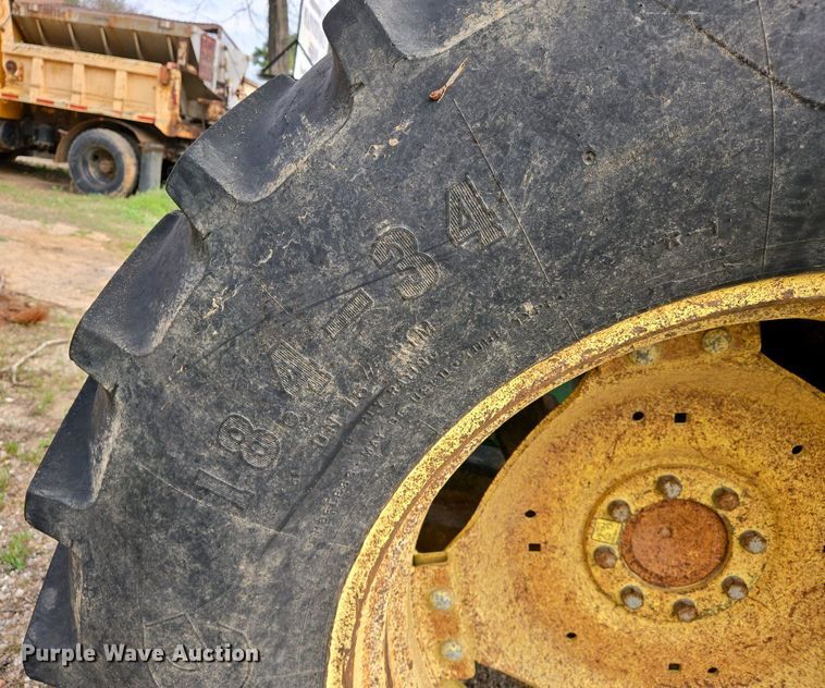 image for item EJ7441 2001 John Deere 6310 tractor