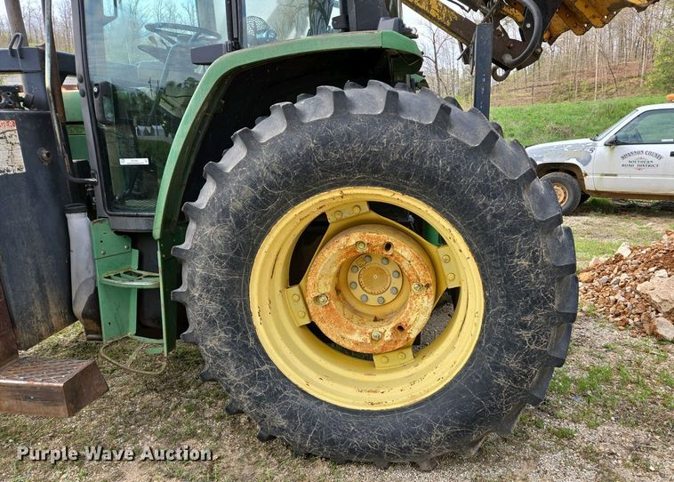 image for item EJ7441 2001 John Deere 6310 tractor